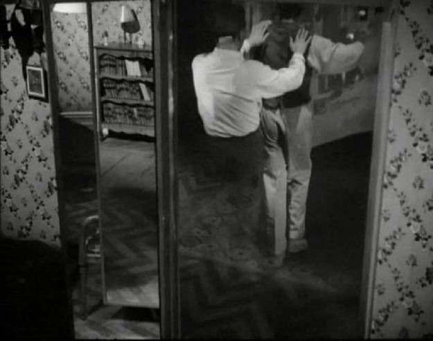 1949_Cocteau_Orphee-through-mirror_c
